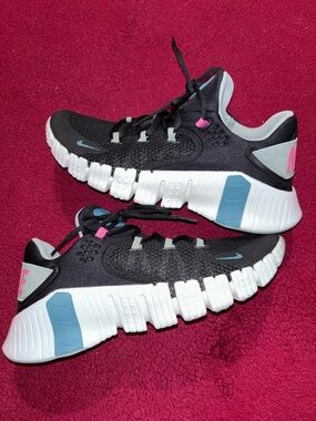 Nike Women's Black Sneakers with Blue and Pink Accents